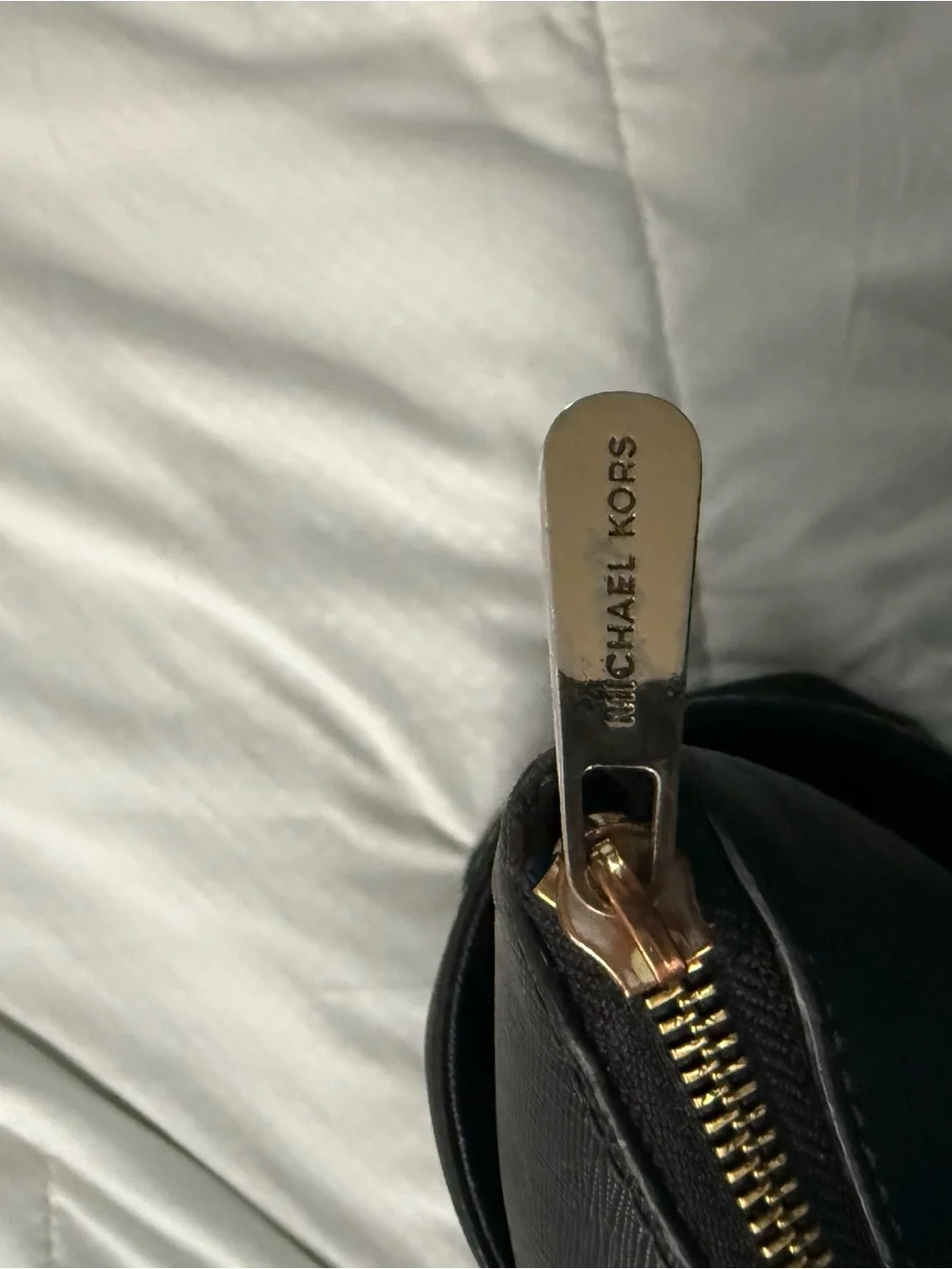 MICHAEL KORS Black Saffiano Tote with Gold Hardware. The straps are messed up